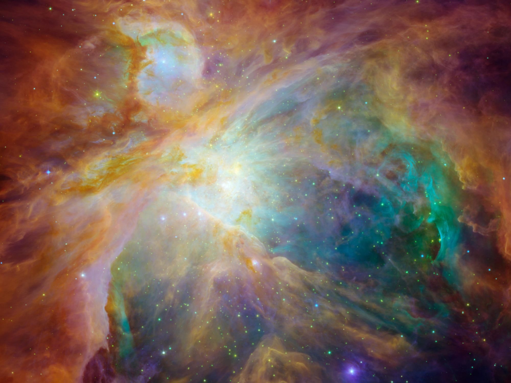NASA shared some interstellar fireworks to end 2020. The Orion Nebula resembles a rainbow-colored painting filled with dots of light.